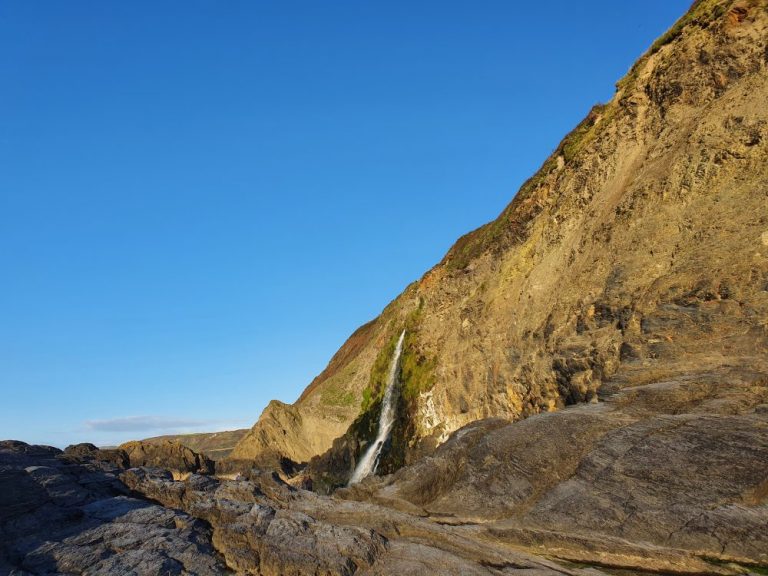 Tresaith Beach waterfall location